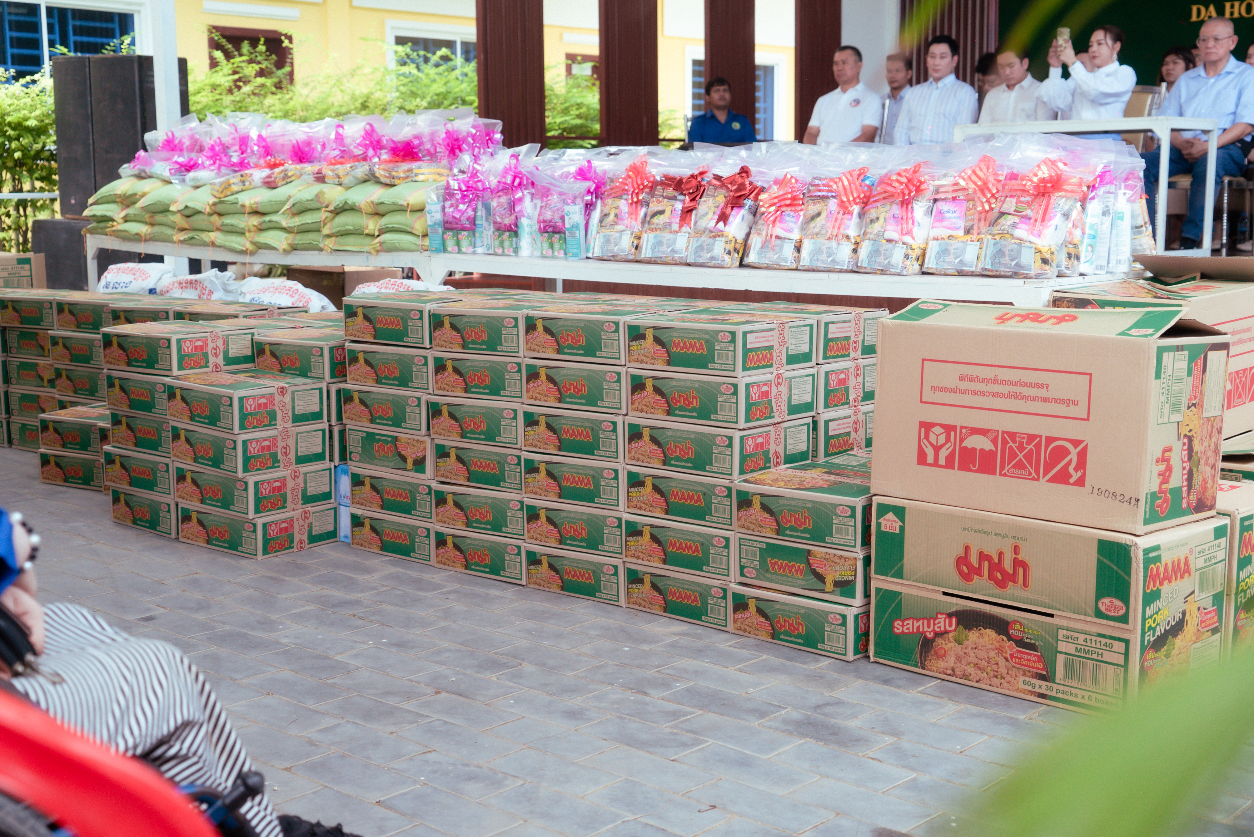 Children receiving educational materials at the event